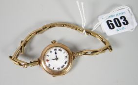 A vintage 9ct encased ladies wristwatch with white enamel dial & Roman numerals Condition reports