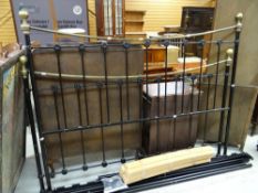 A wrought iron and brass double bed frame Condition reports provided on request by email for this