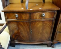 A bow front reproduction cabinet Condition reports provided on request by email for this auction