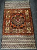 An Old Baluchi rug, 151 x 93cms Condition reports provided on request by email for this auction