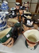 A good collection of nine Royal Doulton character jugs including 'Golfer' x 2, 'Robinson Crusoe' &