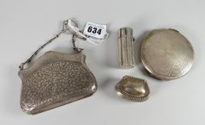 Four items of antique silver etui comprising floral engraved purse, machine turned compact, pouch