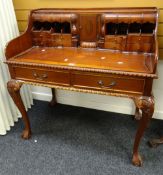 Reproduction hardwood writing desk with fitted shelves and pigeon holes raised on cabriole legs