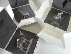 Three boxed Swarovski Silver Crystal ornaments Condition reports provided on request by email for