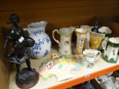 A parcel of pottery jugs, a spelter figurine and a Beswick pottery wall mounted flower basket