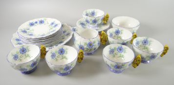 A quantity of vintage Aynsley teaware, registration number 767014 with butterfly hands Condition