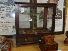 A vintage cased chemist's scales by Oertling of London together with boxed weights Condition reports