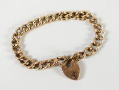A cased 9ct yellow gold link bracelet & heart shaped padlock, 14 grams Condition reports provided on