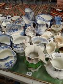 A quantity of Welsh & Staffordshire pottery transfer jugs together with an Ironstone bowl & a lustre