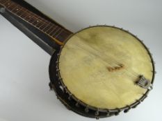 A vintage five-string cased banjo and a cased Boosey & Hawkes clarinet Condition reports provided on