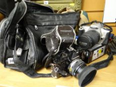 Parcel of vintage cameras including Olympus Om-1, Canon, Digital Cybershot Condition reports