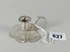 A good William IV naturalistic silver taper stick in the form of a leaf having scalloped nozzle
