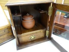 A small vintage oak smoker's cabinet with mixing jar & drawer Condition reports provided on