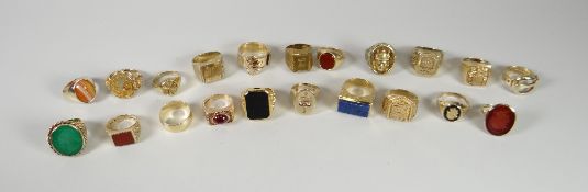 Twenty-one 9ct yellow gold set rings, all marked 375, total weight 175grams Note:potential