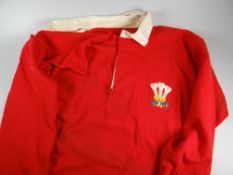 A 1953-1957 WALES RUGBY UNION MATCH WORN JERSEY NUMBER 4, ISSUED TO GARETH GRIFFITHS with white