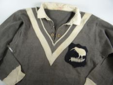 A 1950s NEW ZEALAND KIWIS RUGBY LEAGUE JERSEY with embroidered crest to stitched felt panel,