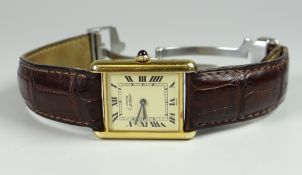 CARTIER LADIES GOLD PLATED AND SILVER WRISTWATCH, the face marked 