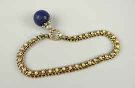 YELLOW METAL SEED PEARL SET BRACELET HAVING BELIEVED LAPIS LAZULI DROP. 17.2 grams approximately