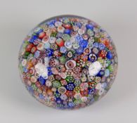 BACCARAT CARPET-GROUND PAPERWEIGHT dated 1847 with in tightly packed canes of floral bird and animal