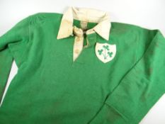 A 1950s IRISH RFU JERSEY NUMBER 14 MATCH-WORN with embroidered crest to a stitched shield panel,