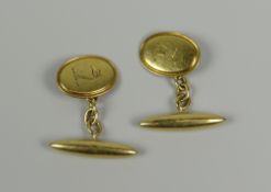 PAIR OF 18CT YELLOW GOLD CUFFLINKS WITH ENGRAVED GREYHOUND ARMORIAL. 7.6 grams approximately. (2)