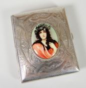 EDWARDIAN SILVER ENGRAVED CIGARETTE CASE of curved rectangular form, foliate engraved with central