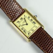 CARTIER LADIES GOLD PLATED AND SILVER WRISTWATCH, the face marked 