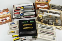 QUANTITY OF MOSTLY BOXED MARKLIN MINI-CLUB N-GUAGE ROLLING STOCK AND TRACK.
