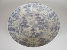 A BELIEVED SEVENTEENTH CENTURY WANLI CHARGER DISH underglaze blue decoration with centred