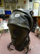 LOT HAS BEEN WITHDRAWN Treen and leather bust of an African lady