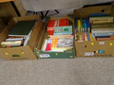 Four boxes of mixed books