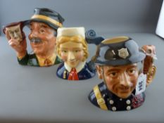 Large Royal Doulton jug 'The Collector' and two Royal Doulton International Collector's Club small