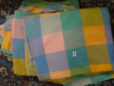 Two multi-coloured vintage blankets