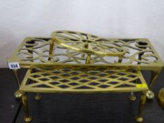 Two oblong and one oval brass teapot/kettle stands