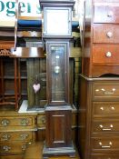 Modern grandmother clock with brass and silvered dial