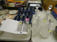 Four boxed sets of glassware and four sundry decanters