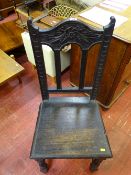 Carved hall chair and a vintage Bassett hound cuddly toy