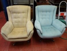 Pair of mid Century style swivel egg shaped easy chairs
