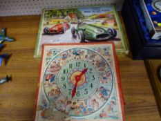 Boxed picture puzzle clock and a wood jigsaw puzzle of 'The Car Race' both by Hayter
