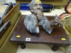 Plaster bust of a European merchant and a footstool