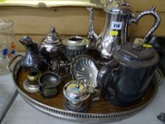 Circular wooden tray with electroplated gallery and a quantity of mixed electroplate including