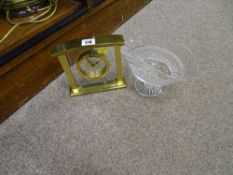 Decorative pedestal glass bowl and an ornamental brass effect mantel clock
