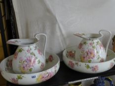Pair of Doulton Burslem toilet jugs and basins (one set in fair condition, the other set with