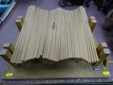 Interesting treen model by Peter Markey of a wind-up small planks depicting the sea and a bobbing