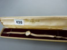 Cased lady's Bentina Star nine carat gold circular dial wristwatch with nine carat gold bracelet