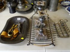 Small oblong tinware tray, pair of brass candle snuffers, metallic religious ornament, pair of