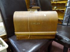 Wooden cased Singer sewing machine