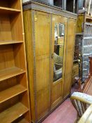 Polished wardrobe with centre mirrored door and railback dressing table with two drawers (near