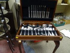 Reproduction floorstanding part canteen of cutlery with tooled leather effect top