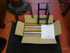 Pair of boxed chrome coloured speaker stands and another pair of speaker stands